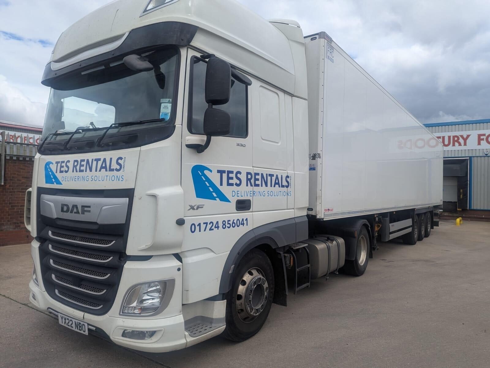 TES DAF tractor unit with box trailer at the depot