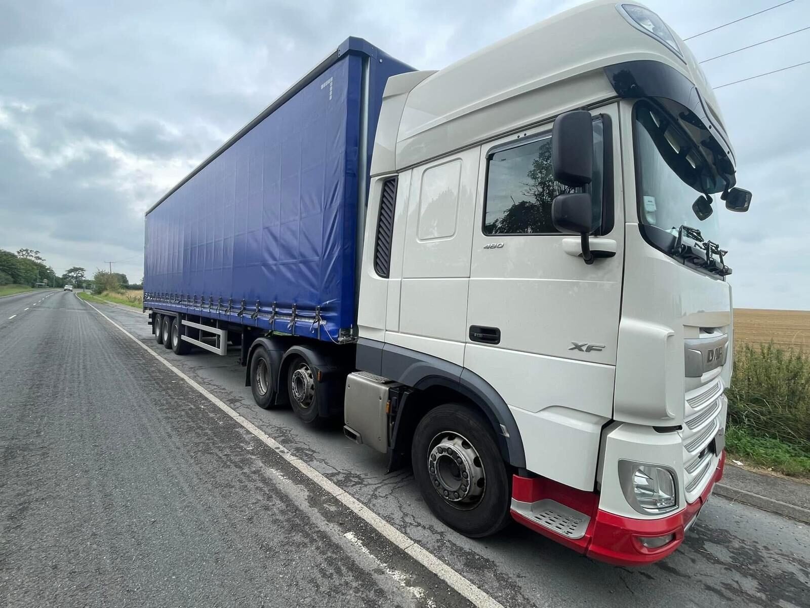 TES DAF curtainsider on the road